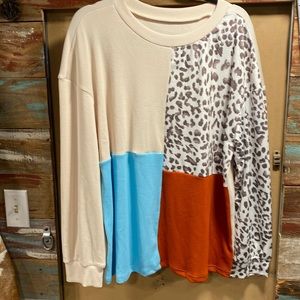 Top with ivory, teal, Burnt orange and animal print